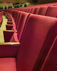 Empty red chairs in theater Europe Lithuania.