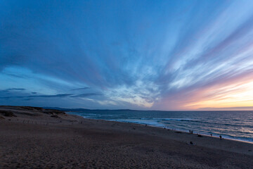 Dramatic sunset on the Pacific ocean beach