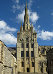 Fototapeta na wymiar Cathedral of Norwich. View of the crossing facade, lantern tower and spire. Norman Romanesque 11-12 century. East Anglia. United Kingdom. 