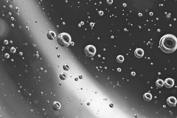 Dark oil with bubbles. Bubbles in liquid. Black and white. Oil concept. Oil business concept and petrol production