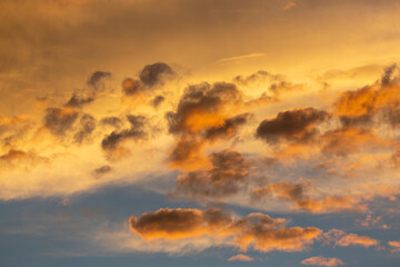 Monsoon clouds above the Sonoran Desert in the heat of summer. Heaven like, with heavenly fluffy, billowing, colorful cloudscapes high in the sky. Tucson, Arizona, USA.