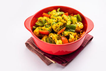 Indian phool Gobi Shimla Mirch Sabji Recipe or Capsicum Cauliflower Sabzi  - a healthy and homemade dry vegetable dish. 