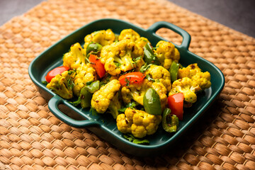 Indian phool Gobi Shimla Mirch Sabji Recipe or Capsicum Cauliflower Sabzi  - a healthy and homemade dry vegetable dish. 