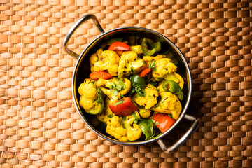 Indian phool Gobi Shimla Mirch Sabji Recipe or Capsicum Cauliflower Sabzi  - a healthy and homemade dry vegetable dish. 