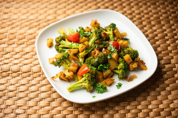 Indian style Broccoli And Aloo Poriyal or South Indian Broccoli And Potato Stir Fry vegetable recipe