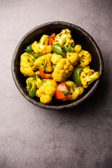 Indian phool Gobi Shimla Mirch Sabji Recipe or Capsicum Cauliflower Sabzi  - a healthy and homemade dry vegetable dish. 