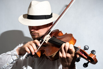 Professional violinist playing a violin