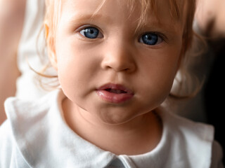 Close-up portrait of a blue eyed baby.