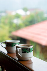 cup of coffee in the cafe. two cups of coffee on the terrace front table