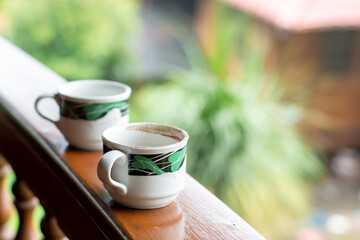 cup of coffee in the cafe. two cups of coffee on the terrace front table