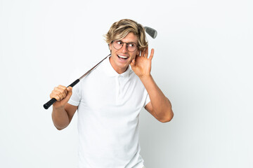 English man playing golf listening to something by putting hand on the ear