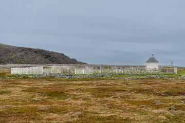 Fototapeta na wymiar The view of old cementary in Hemmendorf at Varanger Penisula in Norway.
