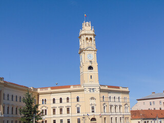 the clock tower of Oradea City Hall