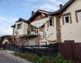 facades of buildings in the city of Bucha damaged as a result of the war