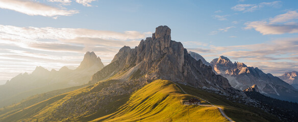 Stunning view of the Giau pass during a beautiful sunset. The Giau Pass is a high mountain pass in...