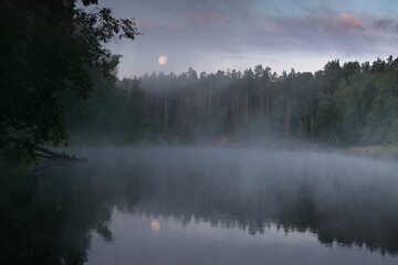 Morning by the river in the moonlight.