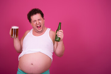 Funny fat man drinks light beer.	