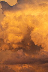 Monsoon clouds above the Sonoran Desert in the heat of summer. Heaven like, with heavenly fluffy, billowing, colorful cloudscapes high in the sky. Tucson, Arizona, USA.