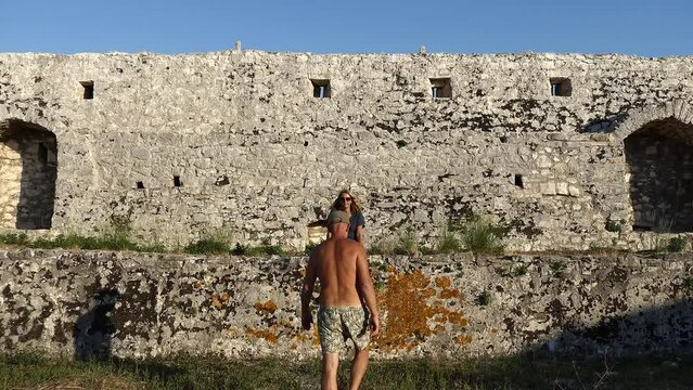Ksamil, Albania A couple at the Ali Pasha Castle, an Ottoman fort.