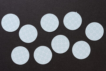 paper circles on gray paper