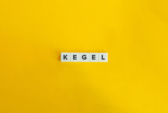 Kegel Word on Letter Tiles on Yellow Background. Minimal Aesthetics.