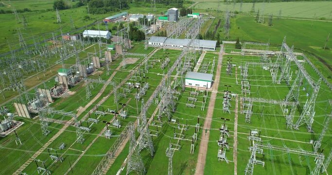 Electrical substation aerial view. An electrical installation designed for receiving, converting and distributing electrical energy. High voltage power station. Power line support and transformers