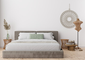 Empty white wall in modern bedroom. Mock up interior in scandinavian, boho style. Free, copy space for your picture, text, or another design. Bed, macrame, pampas grass. 3D rendering.