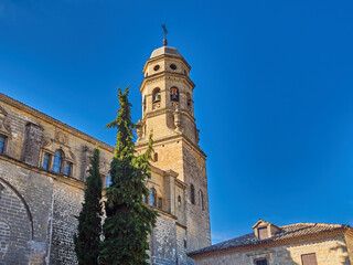 Fototapeta na wymiar Baeza Cathedral with a bright blue sky and copy space. Province of Jaen, Andalusia, Spain, Europe