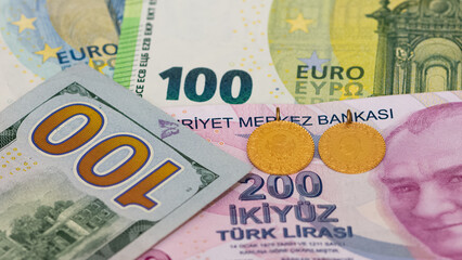 various banknotes. Photos of the US dollar, Turkish lira and euro.