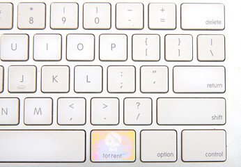 a keyboard with a dedicated key for torrent