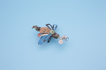 a robo dragonfly built from scrap metal