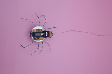 a robot spider built from scrap metal