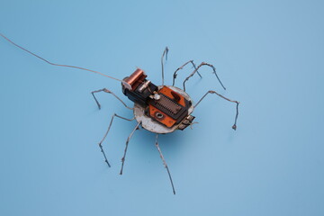 a robot spider built from scrap metal