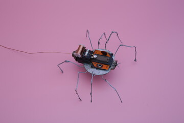 a robot spider built from scrap metal