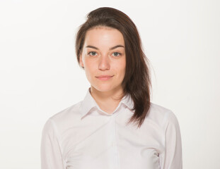 portrait of a girl in a white shirt isolated.close-up portrait of a young girl in a white shirt on a white background isolated.emotions joy happiness surprise calmness chagrin.win lose.