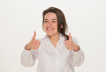 portrait of a girl in a white shirt isolated.close-up portrait of a young girl in a white shirt on a white background isolated.emotions joy happiness surprise calmness chagrin.win lose.