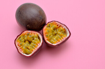 passionfruit fruit on pink background close-up