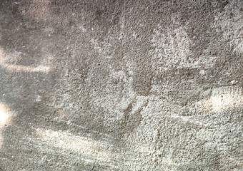 Old stone wall. Grunge concrete and plaster texture,