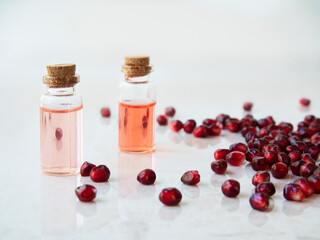 Two Bottles of Pomegranate Extract
