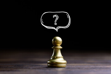 Question mark concept or FAQ. Sign over chess pawn