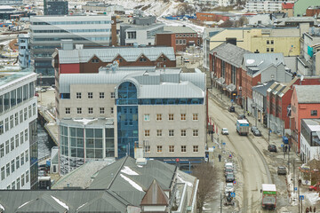 Aerial view of Bodo city in Norway with a busy main road. A scenic modern urban landscape of...