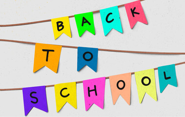 Back to school on colorful small colorful flag hang on rope background. Back to school card or banner with typography design.