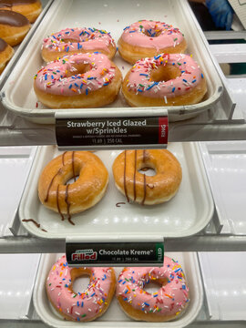 Famous Krispy Kreme for sale in display case. 