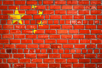 Chinese flag on a grunge brick background.