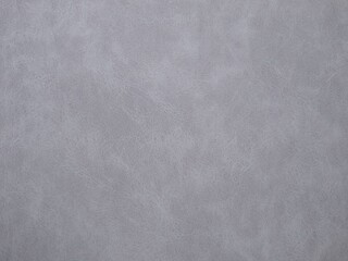Grey suede surface with an obvious structure as the background