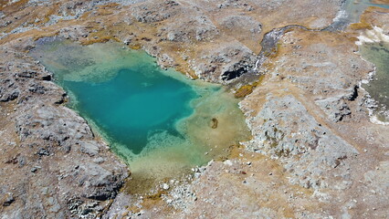 Mountain glacier lake. Picturesque hidden location in the mountains. Outdoors style vacation....