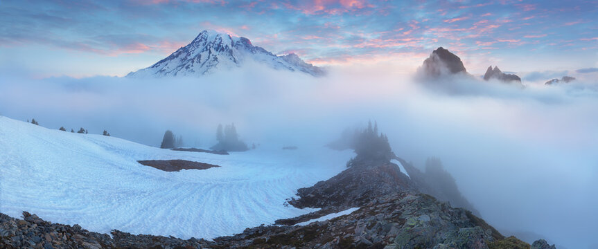 Mount Rainier National Park in the Cascade Range, Washington State, USA. A beautiful active volcano at sunset in North America. Summer time.