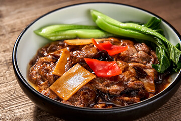 Asian cuisine fried tofu skin with vegetables and peppers