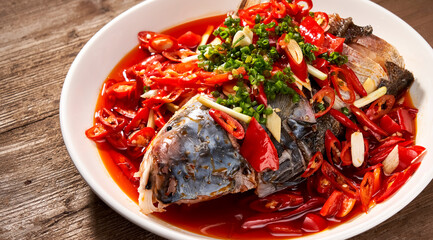 Asian food mountain chopped pepper fish head