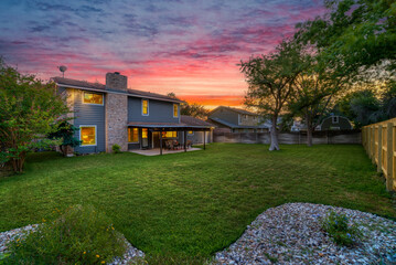 A sunset at a home in the countryside - Powered by Adobe